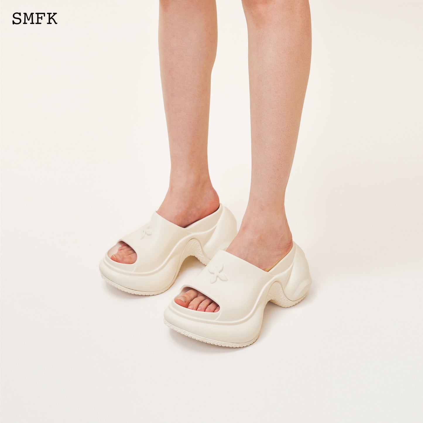 Compass Wave High-Heel Bumper Sandal Cream White