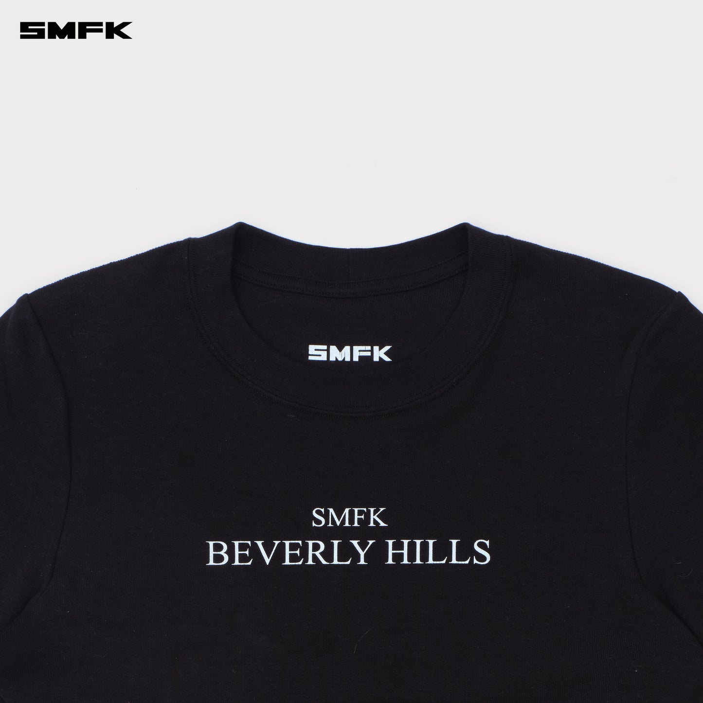 COMPASS Beverly Movie Subtitles Crop Tee Wilderness Black