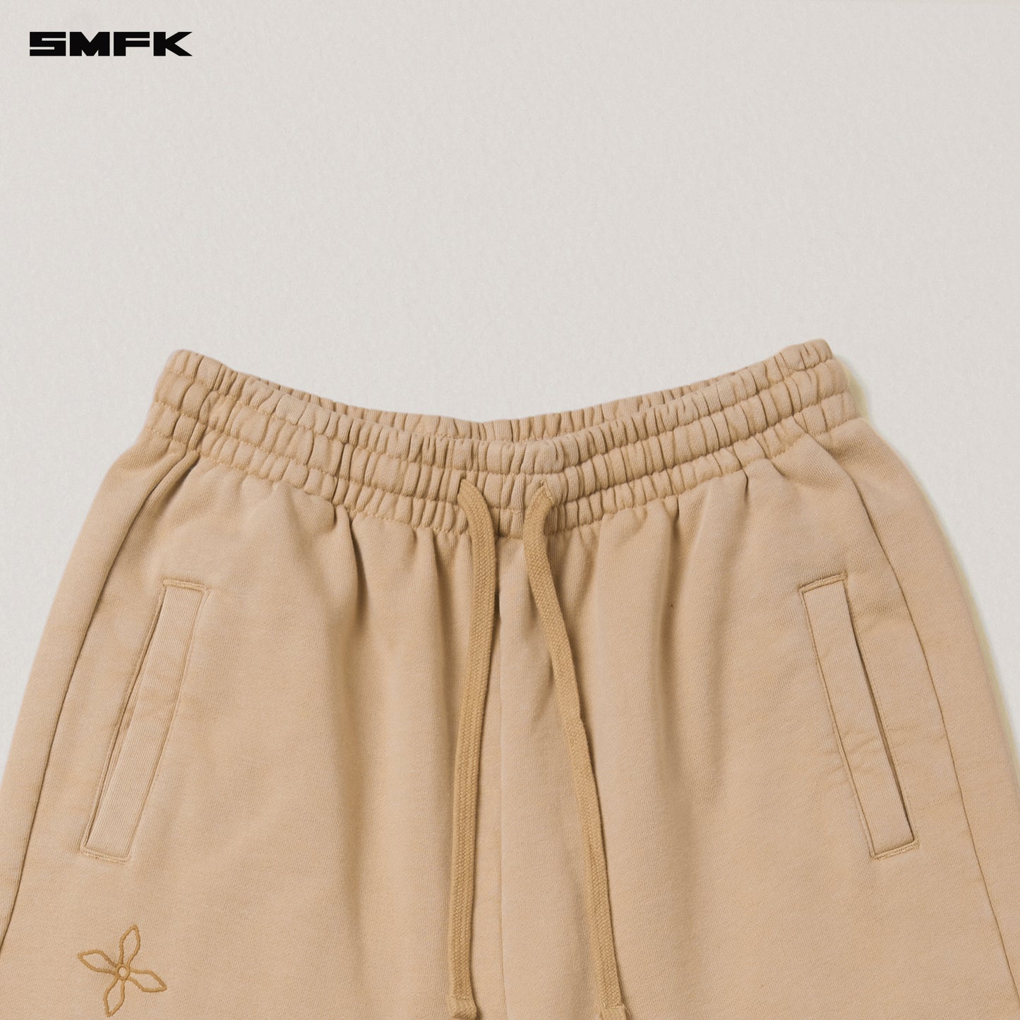 COMPASS MODE TOWER LOOSE SPORTS PANTS Sandy Khaki
