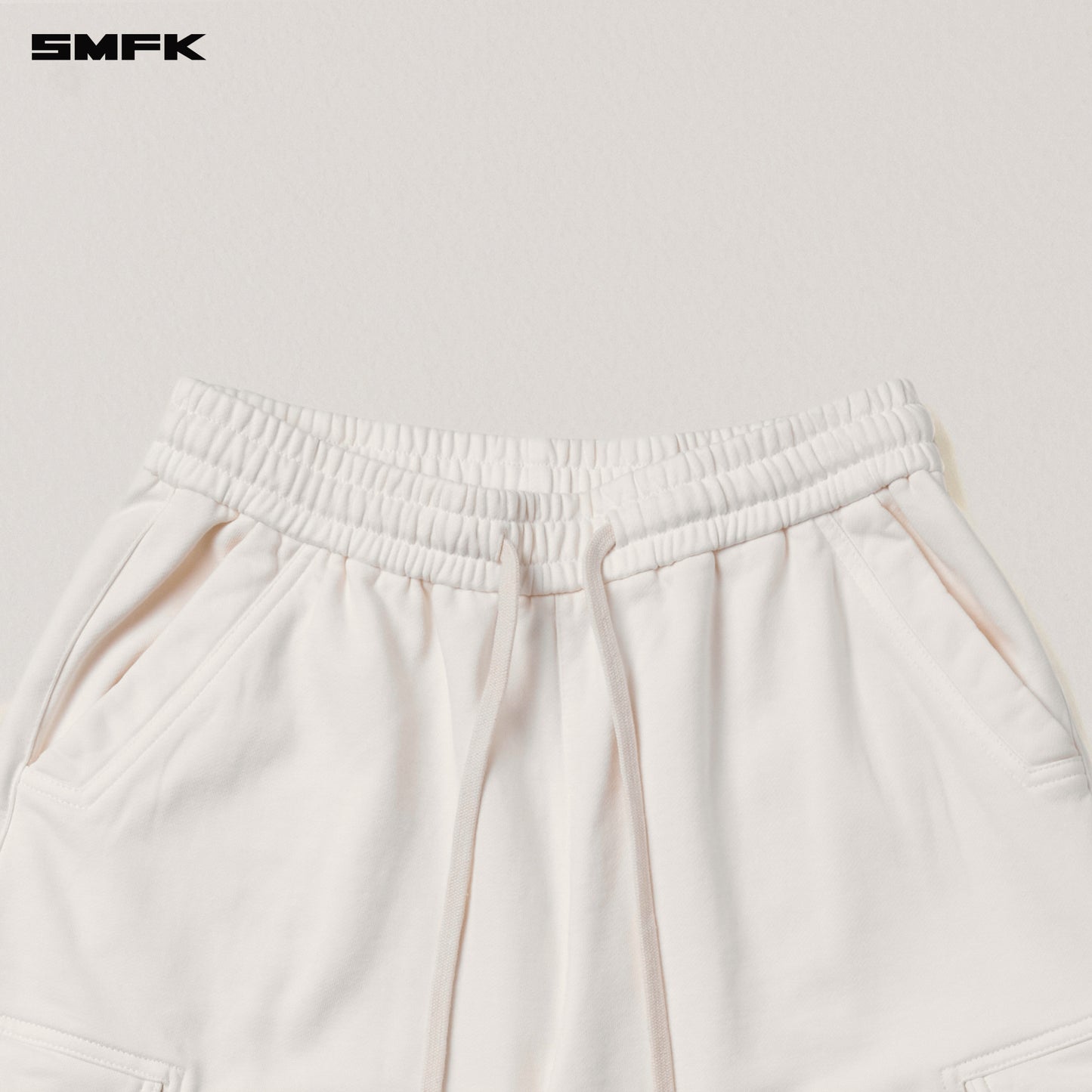 VINTAGE-SAFARI LOOSE SPORTS PANTS/FADE DYE Alpine White