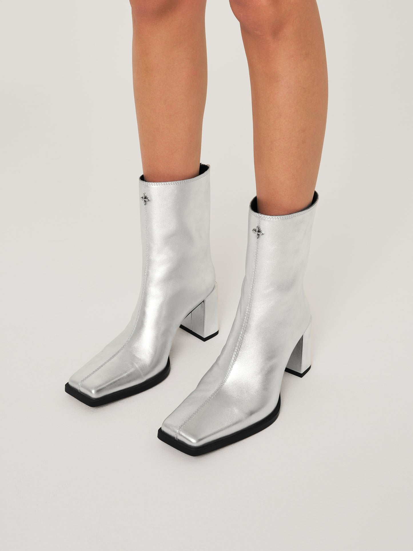 COMPASS STAGE Leather High-heeled Boots Stardust Silver